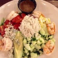 Shrimp and Crab Cobb Salad · Mixed greens with shrimp and crab, tomato, red onion, cucumbers, bleu cheese crumbles, bacon...