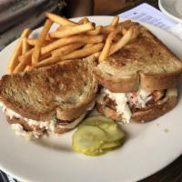 Grouper Reuben · Grilled, blackened, or fried with Swiss cheese, 1000 Island dressing, and coleslaw on grille...