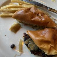 Black Bean Burger · Topped with portabella mushroom, provolone cheese, lettuce, tomato and arugula.