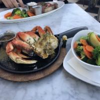 Hot Sizziling Dungeness Crab Legs · 