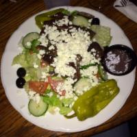 Greek Salad · Romaine lettuce, green pepper, cucumber, tomato, feta cheese, Kalamata olives, pepperoncini,...