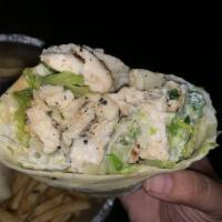 Grilled Chicken Caesar Wrap · Grilles Chicken, romaine lettuce, grated cheese, caesar dressing served with fries or salad