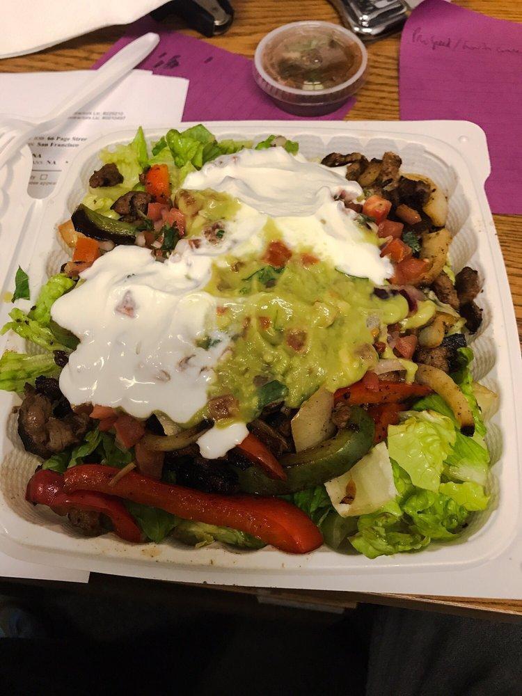 Fajita Salad · Grilled peppers and onions, lettuce, cheese, guacamole, sour cream and salsa.