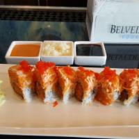 Dynamite Roll · In: spicy salmon and tempura flake. Top: with spicy crab and tobiko.