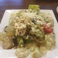 Greek Salad · Lettuce, tomatoes, cucumbers, red onions,banana peppers, Kalamata olives and feta cheese wit...