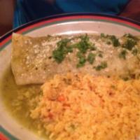 Asada Burrito · A large flour tortilla filled with tender charbroiled strips of steak, whole pinto beans, gu...