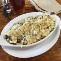 Bacon & Truffle · White cheese sauce, pasta, diced applewood, bacon, sauteed mixed mushrooms. Topped with Parm...