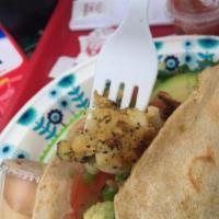 Crab Cake Tacos · Our famous crab cakes served on 8 inch taco shells (they are huge) with spring mix, green on...