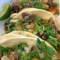 Taco Truck Taco · Corn Tortilla, Meat, Onions, CIlantro, Salsa