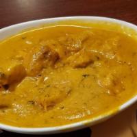 Chicken Korma · Boneless pieces of chicken cooked in a combination of cashew and fried onion gravy with spic...