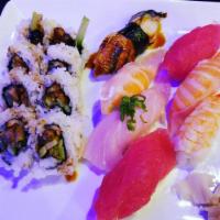 Sushi and Sashimi Combo Deluxe Special · Chef’s choice of 5 pieces sushi, 7 pieces sashimi, and your choice of a basic roll. Served w...