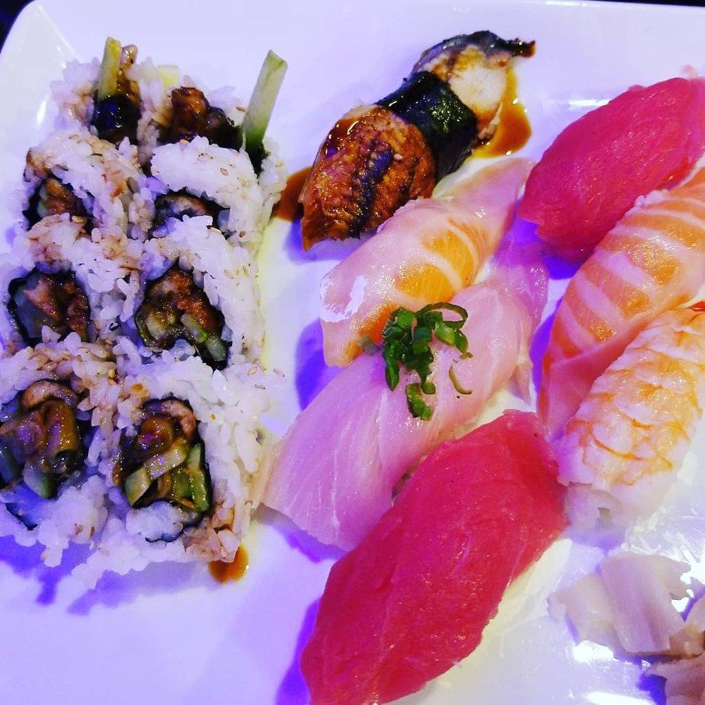 Sushi and Sashimi Combo Deluxe Special · Chef’s choice of 5 pieces sushi, 7 pieces sashimi, and your choice of a basic roll. Served with salad and miso soup.