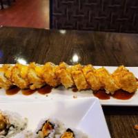 Las Vegas Roll · Smoked salmon, avocado, cream cheese, and crispy Japanese bread crumb with eel sauce and spi...