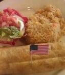 Chimichanga · 10-inch flour tortilla stuffed with your choice of meat, deep-fried and topped with cheese d...