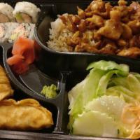 Chicken Bento Box · Served with garden salad, 4 pieces California roll, 3 pieces dumplings, choices of steamed r...