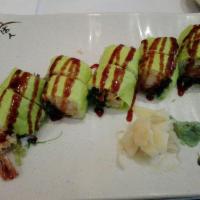 Forest Hills Roll · Shrimp tempura, eel with seaweed salad.