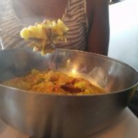 Spanish Bowl · Saffron rice, chicken, shrimp, bell peppers, chicken andouille sausage, and roasted red bell...