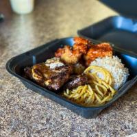 Kalua Pork Lunch Plate · Includes two sides.