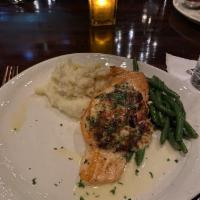 Crab And Shrimp Stuffed Salmon · Crab Meat and Shrimp/
Brie Cheese/ Artichoke Hearts and Sundried
Tomatoes/ served with Mashe...