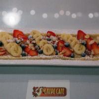Fresh Fruit Blintz · Assorted fresh fruit sprinkled with powdered sugar atop a sweet cheese filled crepe with whi...