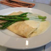 Heavens Crepe · Hormone free black forest ham, Swiss cheese and blanched asparagus, topped with bechamel sau...