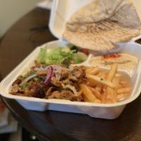 Chicken Shawarma Plate · Our famous chicken shawarma. Served with hummus, a choice of rice or french fries and pita b...