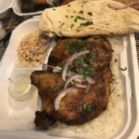 Half Chicken Special · With hummus, pita, and rice.