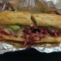 Hot Pastrami Sandwich · Hefty portions of your favorite pastrami dipped in au jus with mustard and topped with peppe...