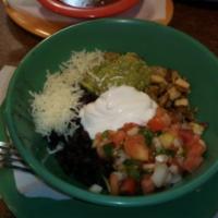 Super Burrito · Choice of meat, Spanish rice, choice of beans, Mexican sweet corn, salsa fresca, guacamole, ...