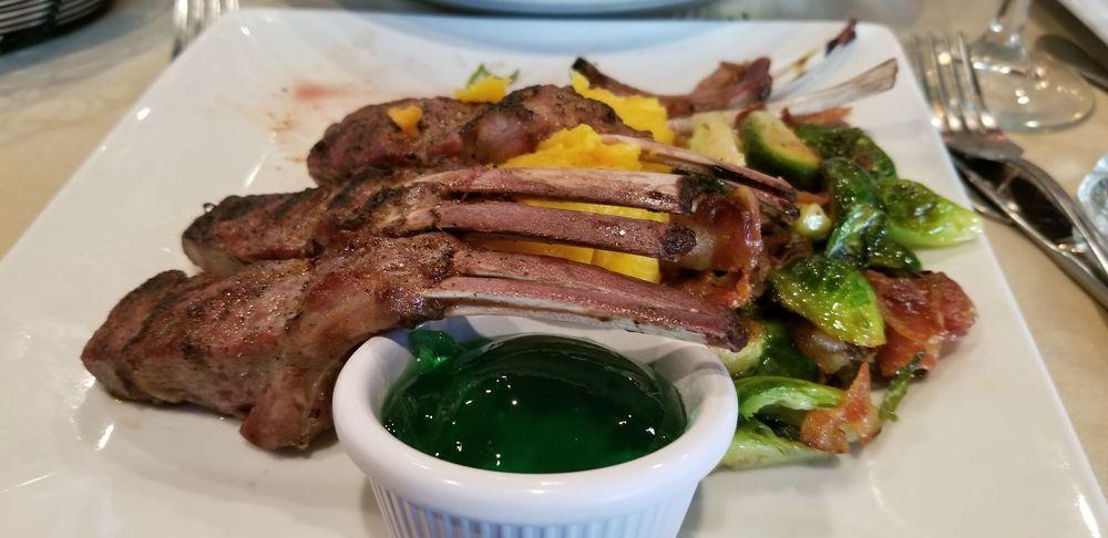 Lamb Chops · Grilled New Zealand lamb chops with sauteed brussel sprouts, bacon and butternut squash puree.