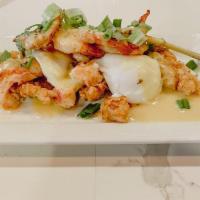 Seafood Benny · 2 Poached Eggs, Real Maine Lobster on Tortilla Crusted Tilapia Filet Topped with Holly Sauce...
