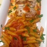 Eggplant Rollatini · Battered eggplant stuffed with ricotta cheese, and topped with tomato sauce and melted mozza...