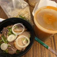 Bun Bo Hue · Vermicelli noodles in spicy Beef soup with flank, pork roll, and pig feet.