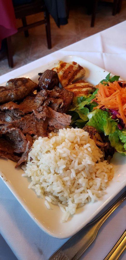 Mixed Kebab · Selection of doner, shish, chicken shish, and kofte served with rice and salad. 
