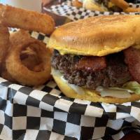 Hippo Texas Burger · 1/2 lb. Angus beef, jalapenos, chili, American cheese, mustard, lettuce, tomatoes, onions.