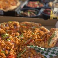 Butter Chicken Pizza · Butter chicken sauce, shredded mozzarella cheese, sliced red onions, sliced green bell peppe...