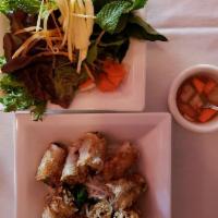 Cha Gio Crispy Vietamese Spring Rolls · Rice paper filled with ground veal, shiitake mushrooms and white jicama and lightly fried in...