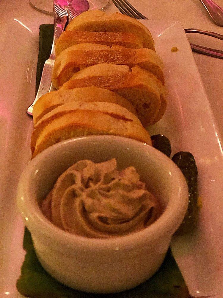 Mousse of Black Truffle Duck Pate · Served with fresh baked sourdough crisps.