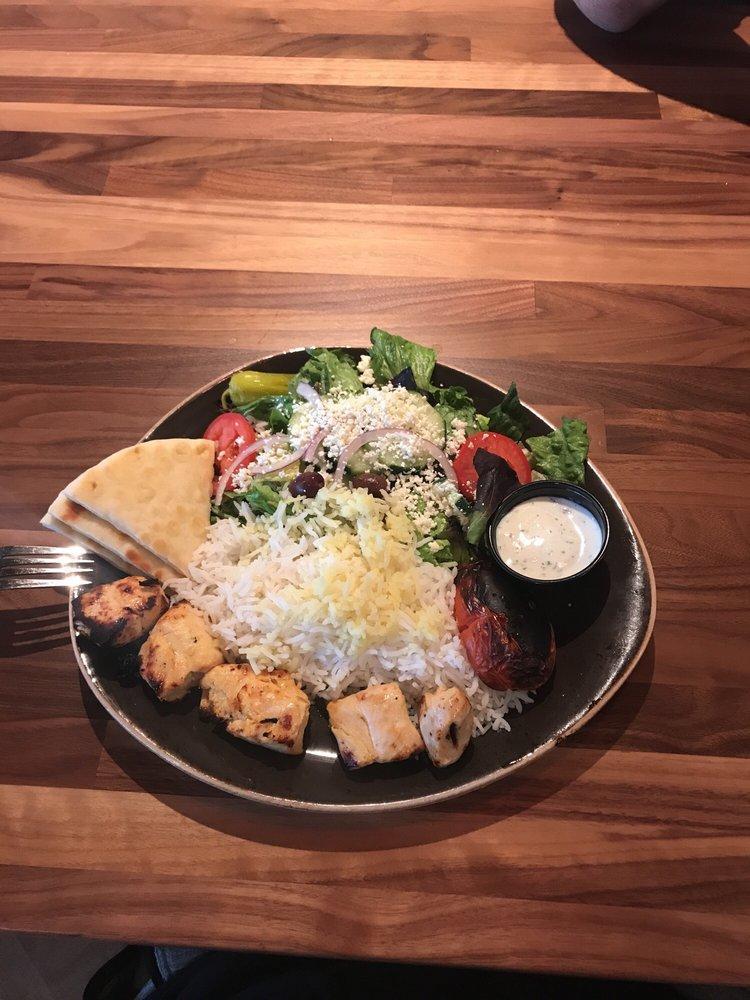 Chicken Kabob Plate · Succulent pieces of boneless chicken tenders. Plates include: Basmati rice, pita bread, tzatziki, and choice of house salad (+85 Cals), Greek cabbage (+160 Cals) or hummus (original +330 Cals or spicy harissa +440 Cals)
