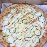 Pickle Pizza · A white pizza with sliced dill pickles, cheese & ranch dressing.
