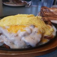 Country Skillet · Country fried steak, country gravy and cheddar cheese. Served with scrambled eggs, homefries...