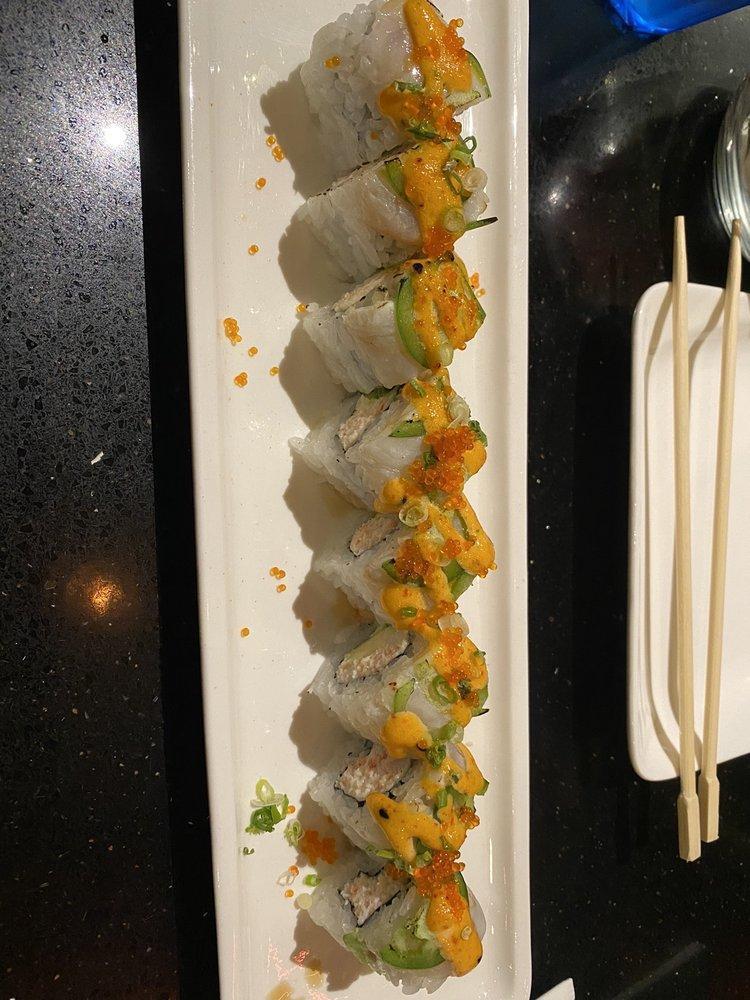 Castro Roll · Seared white fish, real crab meat, jalapeno, house special sauce, avocado, sushi rice, seaweed paper.