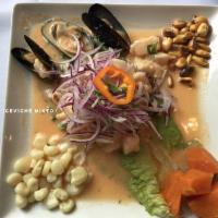 Ceviche Mixto · Fresh fish, calamari, shrimp, mussels and clams marinated in lime juice, salt and pepper and...