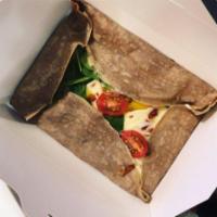 Je Suis President Crepe · Bacon, Brie, Mozzarella, tomatoes and spinach. Made with buckwheat flour. Gluten free.
