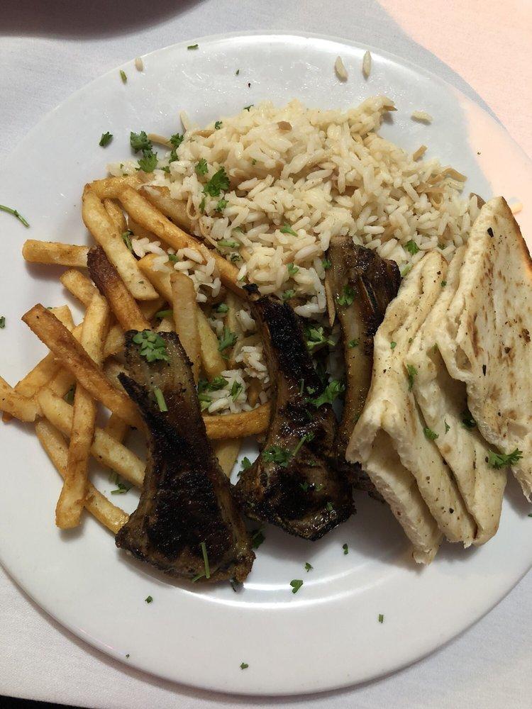 Lamb Chops · 3 New Zealand lamb chops marinated in olive oil, garlic, oregano and house spices. Includes a small Greek salad pita bread and choose fries or rice.