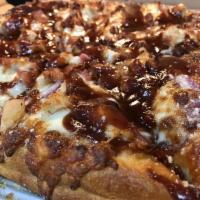 BBQ Chicken Pizza · Sweet baby ray's BBQ sauce, grilled chicken, red onions, bacon and our fresh gourmet cheese ...