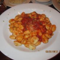 Gnocchi · Homemade in our traditional marinara sauce with Parmigiano cheese.