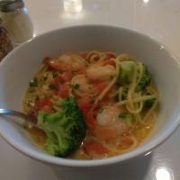 Shrimp Scampi · Jumbo shrimp sauteed with broccoli, tomatoes, garlic, and oil over linguini.