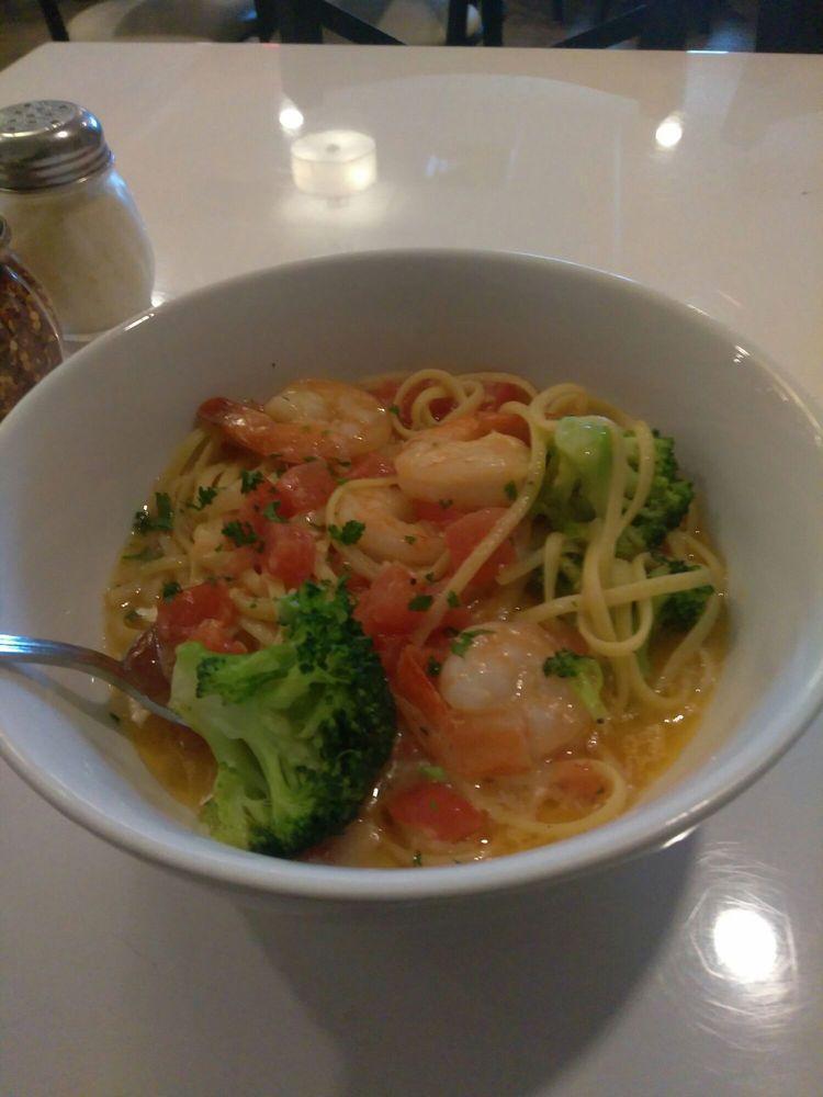 Shrimp Scampi · Jumbo shrimp sauteed with broccoli, tomatoes, garlic, and oil over linguini.