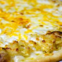 Mac 'n' Cheese Pizza · Macaroni and cheese topped with cheddar and white cheeses.